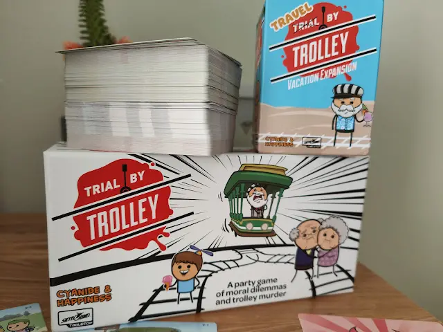 Trial by Trolley and Travel by Trolley game boxes
