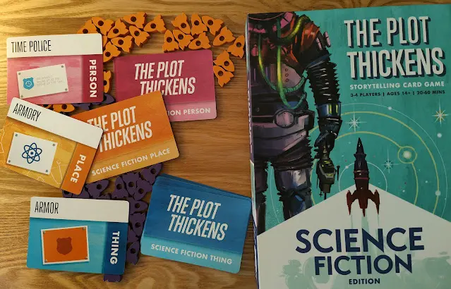 the plot thickens card game laid out on a table